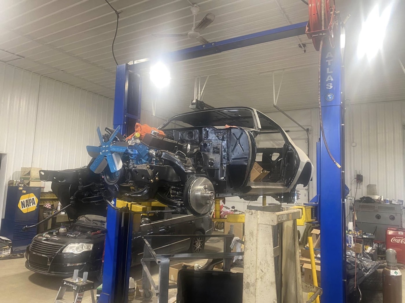 Vehicle body and frame during a restoration teardown at Brady's Auto Service
